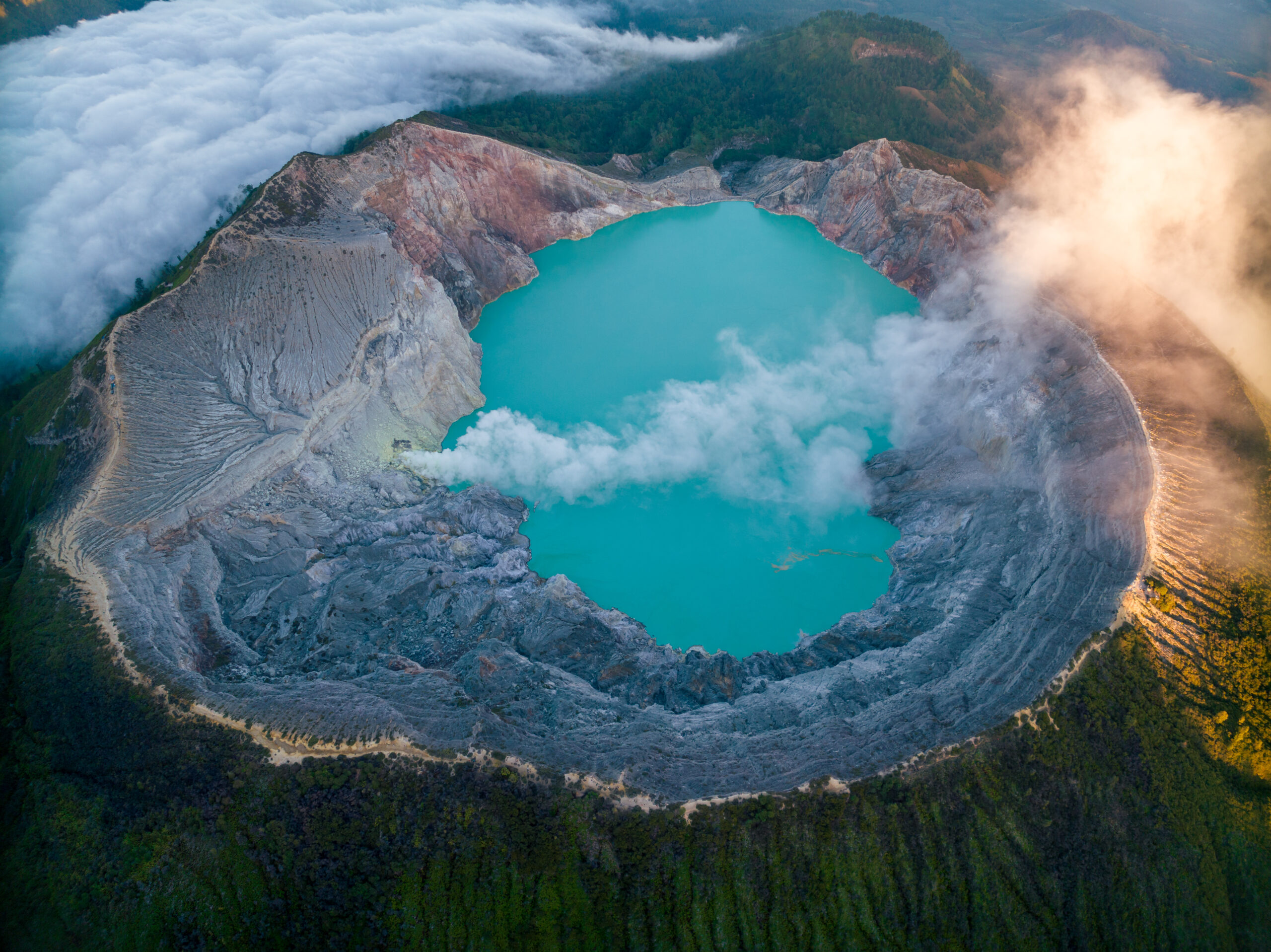 Aerial view of mount Kawah Ijen volcano crater at sunrise, East Java, Indonesia